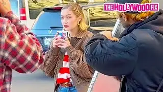 Gigi Hadid Stuns In A Leather Jacket & Blue Jeans While Modeling For Maybelline In The Streets Of NY