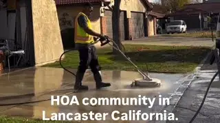 Hot pressure washing driveway in Lancaster CA HOA community 