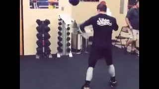 Canelo on the Aqua punching bag