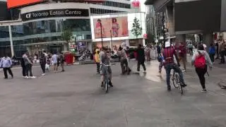 Some angry dudes attempting to launch pro wrestling careers at Toronto Dundas square