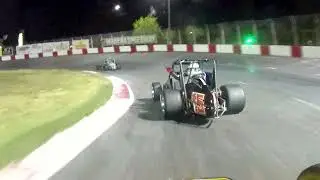 RACE CAR DRIVER LETS THE BIRD FLY