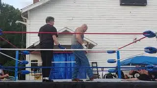 Matt Hankins defeats Bill Behrens for control of Anarchy wrestling and celebrates.