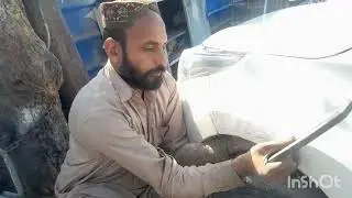 Toyota Corolla finder denting and painting javed auto workshop g10 Islamabad Pakistan 03335552761