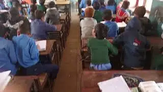 Aurangzeb best student of two class giving presentation activity