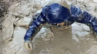 Muddy Swim in snowsuits