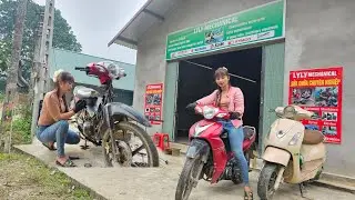The genius girl successfully repaired the old, broken motorcycle.