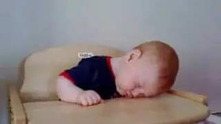 baby falls asleep in high chair