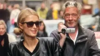 Frank Buis met Paris Hilton & River Viiperi op de fiets in Amsterdam.