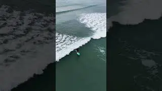Surfing at St Michaels Mount , Cornwall