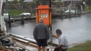 Driving a piling using internal sleeve
