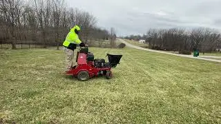 USING THE SPREADER ON THE TORO AERATOR