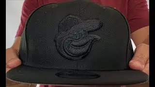 Baltimore Orioles TEAM-BASIC BLACKOUT SNAPBACK Hat by New Era