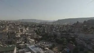 D-Log M. Goreme, Nevsehir, Turkey. Morning drone flight over Goreme's unique cave dwellings and r...