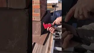 Installing chimney flashing on a metal roof #construction