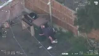 Police dog tackles runaway driver after he climbs down drainpipe