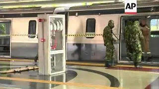 Security forces take part in a drill simulating a militant attack on the World Cup