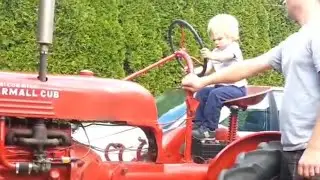 1947 Farmall Cub - new owner takes the wheel (2015)