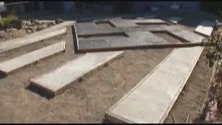 Neighborhood outraged by large swastika in front yard