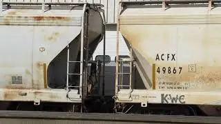 3 ACF Center Flow covered hoppers on the spur at the perlite processing plant near Vicksburg, Mi