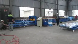 Two workers to operate roll forming machine with manual decoiler