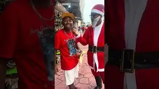 Skinny Santa in Downtown Belize City Asking random Belizeans their Christmas and New Years Plans. 🎅🏻