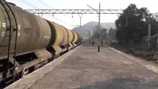 OIL TANKER LOAD BENDING A CURVE AND THROWING SOME DUST AT NERAL JN