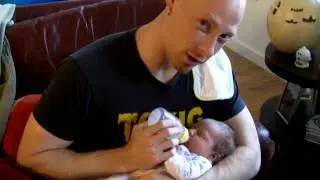 Dad feeding Ave