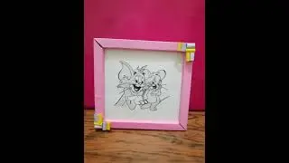 Draw a beautiful sketch of Tom and Jerry with pencil