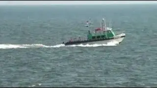 shipping channel traffic on a day of sailing