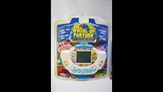 Tiger Electronics Deluxe Wheel of Fortune Run Game #8
