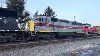 NS 31A past Stoney Creek Rentals with 1700 &ldquo;Erie Lackawanna&rdquo; trailing and a bonus leaser unit