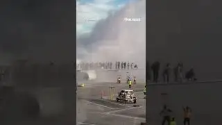 American airlines plane catches fire in Denver