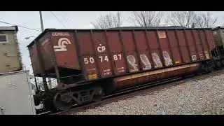 NS loaded coal hopper train crosses shell road