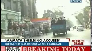 Left: Mamata shielding the accused