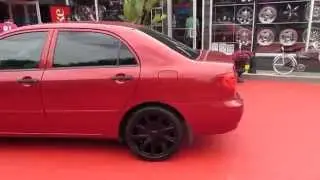 HILLYARD CUSTOM RIM&TIRE 2006 TOYOTA COROLLA RIDING ON 17 INCH BLACK RIMS