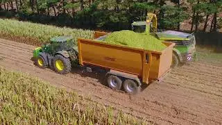 Richard Western PR4024 Pusher Ram Trailer accompanied by John Deere 6215R and 9600i forage harvester