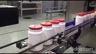 RPM Packaging Machinery - Powder Filling Line - Plastic Jars