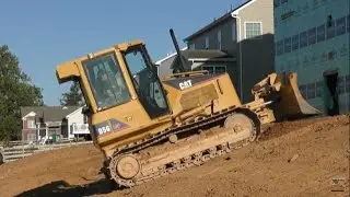 CAT D5G LGP Dozer Grading a Backyard