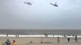 Military attack helicopter cobra viper Huey fly by jersey s