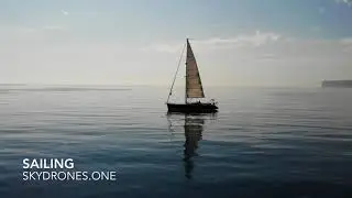 Skydrones Salingboat on flat sea