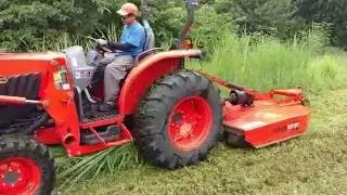Kubota Grand L6060 Bush-Hogging Elephant Grass