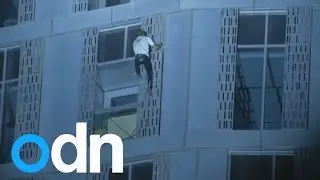 French 'spiderman' Alain Robert scales Dubai's Cayan Tower