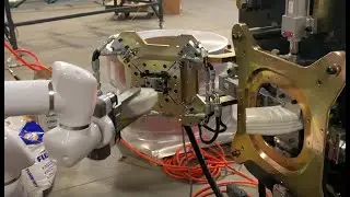 Robot unloading and crimping Elbows