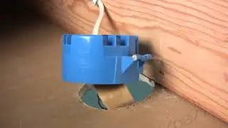 Remove plastic electrical junction box and install a ceiling fan brace