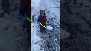 Cute Baby Playing With Snow