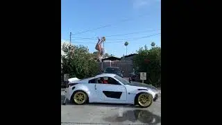 Clumsy influencer backflips and breaks car