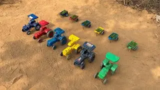 All the tractors took the green grass with them, attached to their trailers.#139 