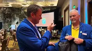 Kevin VanDam and Steve Bowman presenting Rick Clunn, Bass Fishing Hall of Fame iconic blue jacket