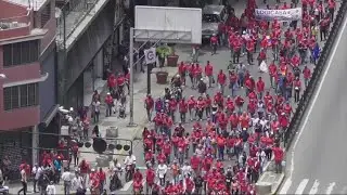 Venezuela: Pro-government activists march through Caracas