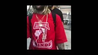 Scrim shaking fans hands